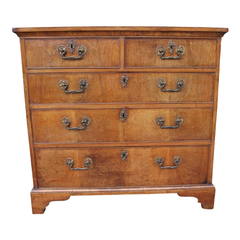 An Exceptional 18th Century Walnut Chest Of Drawers With Gilt Bronze Rococo Handles