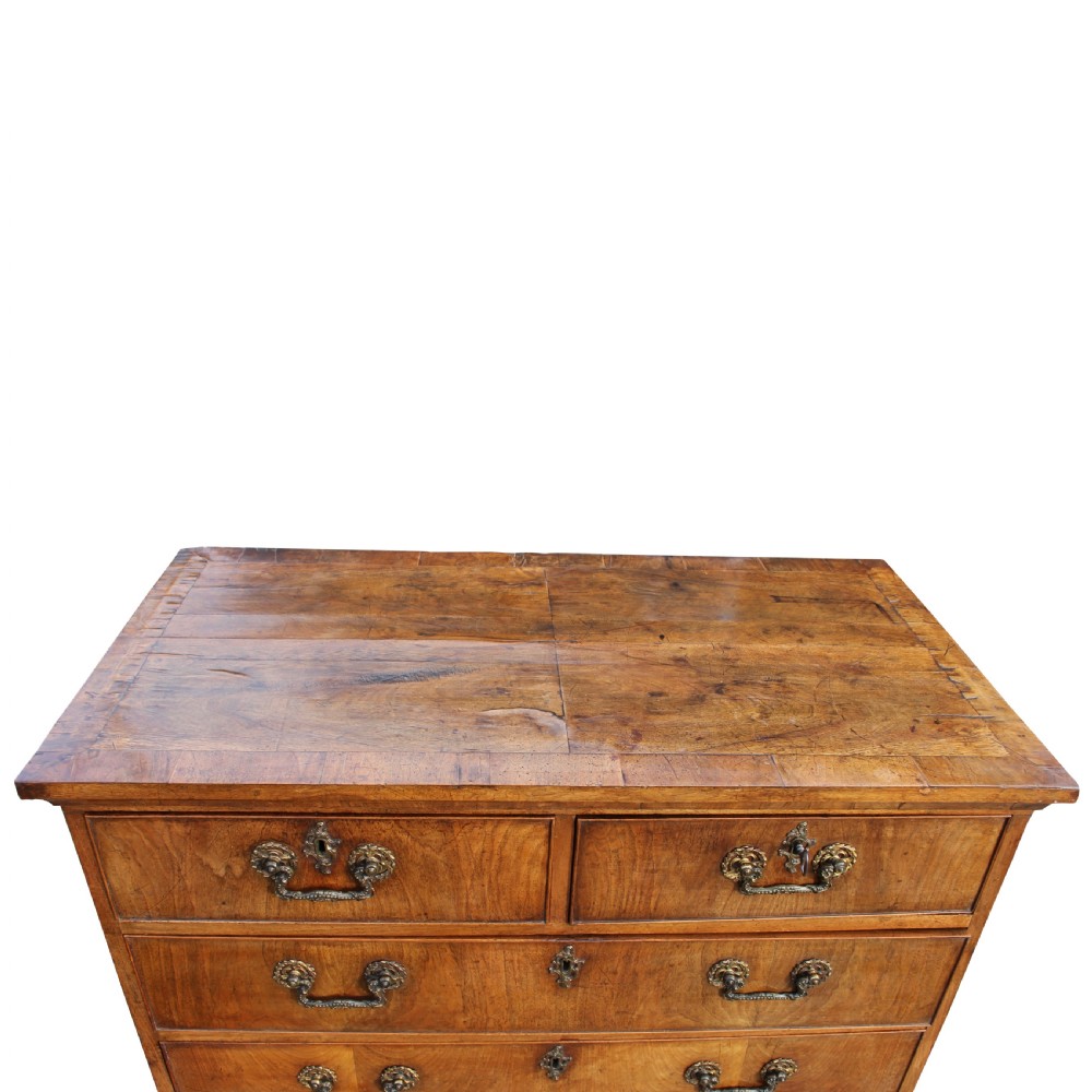 An Exceptional 18th Century Walnut Chest Of Drawers With Gilt Bronze Rococo Handles View III