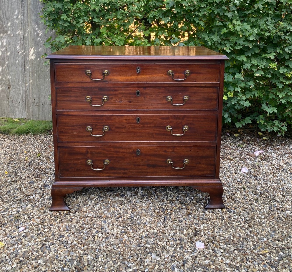 Georgian Solid Mahogany Chest Of Drawers Of Small Proportions With Ogee Feet & Swan Neck Handles