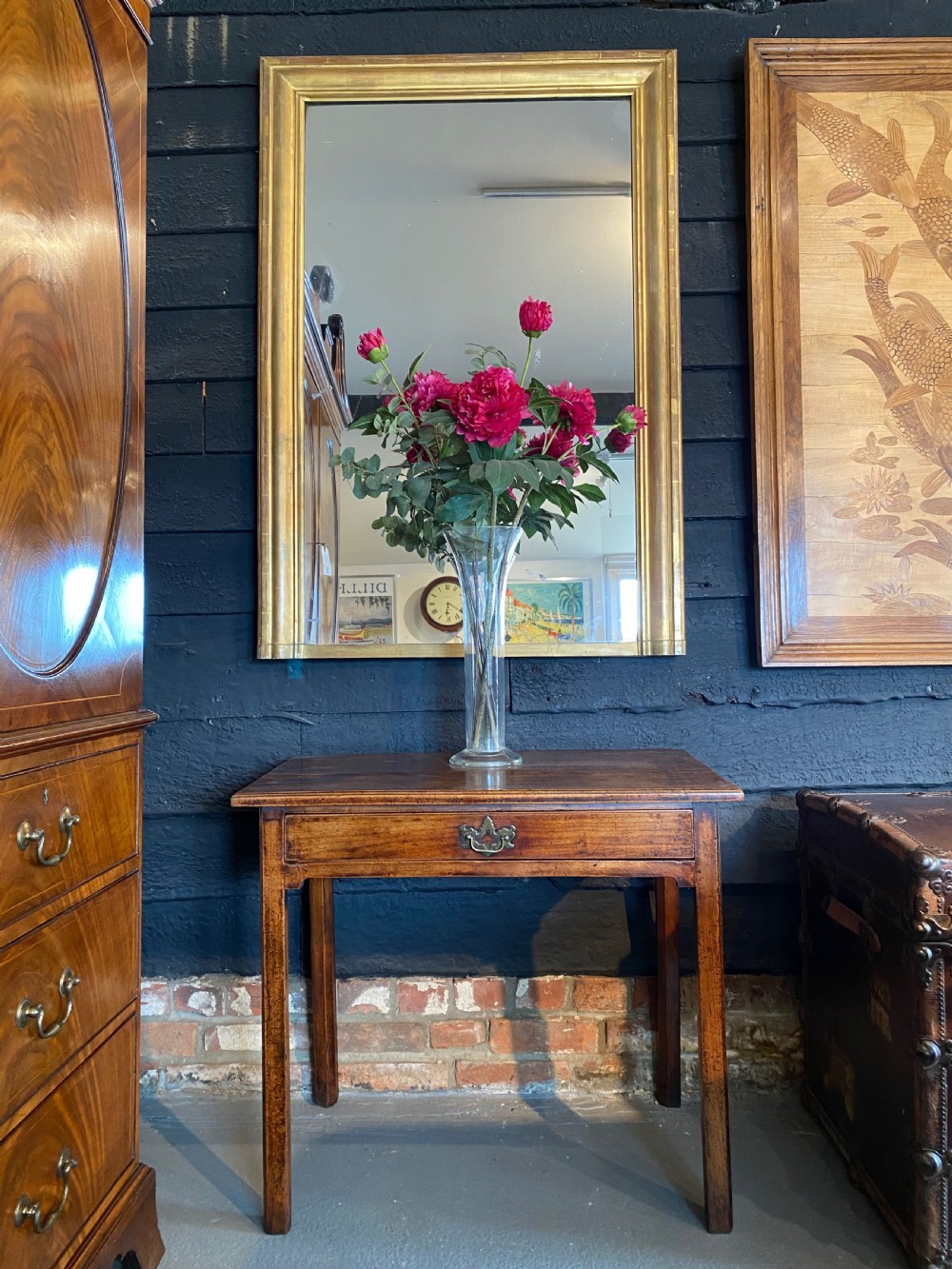 A large rectangular early 19th-century wall mirror featuring a moulded gold leaf giltwood frame and clear mirror plate. View III