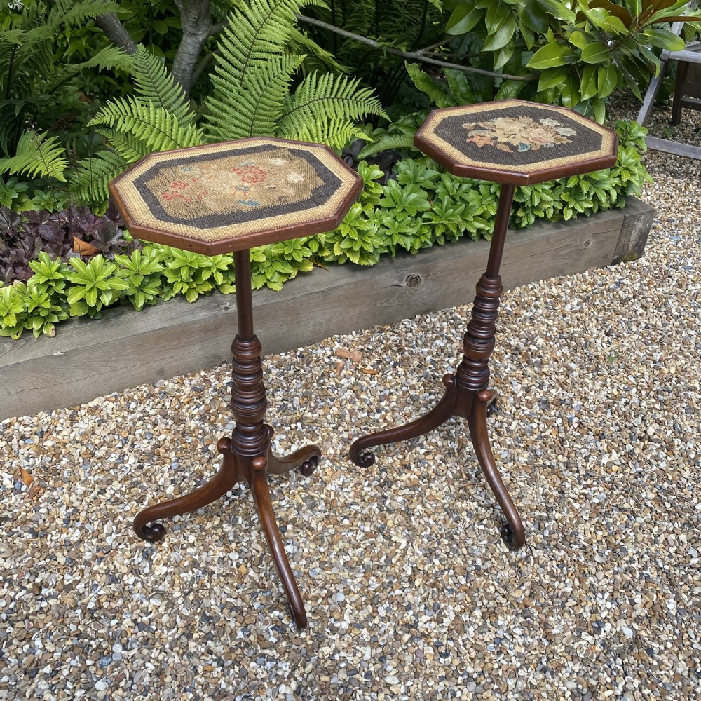 A pair of antique Georgian mahogany wine tables with octagonal needlework tops, ring-turned stems, and tripod bases with scroll feet. View II