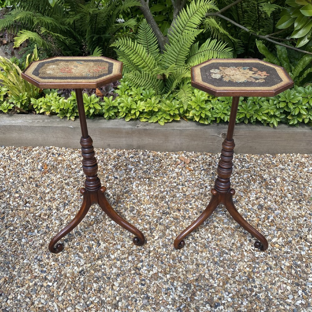A pair of antique Georgian mahogany wine tables with octagonal needlework tops, ring-turned stems, and tripod bases with scroll feet. View VI