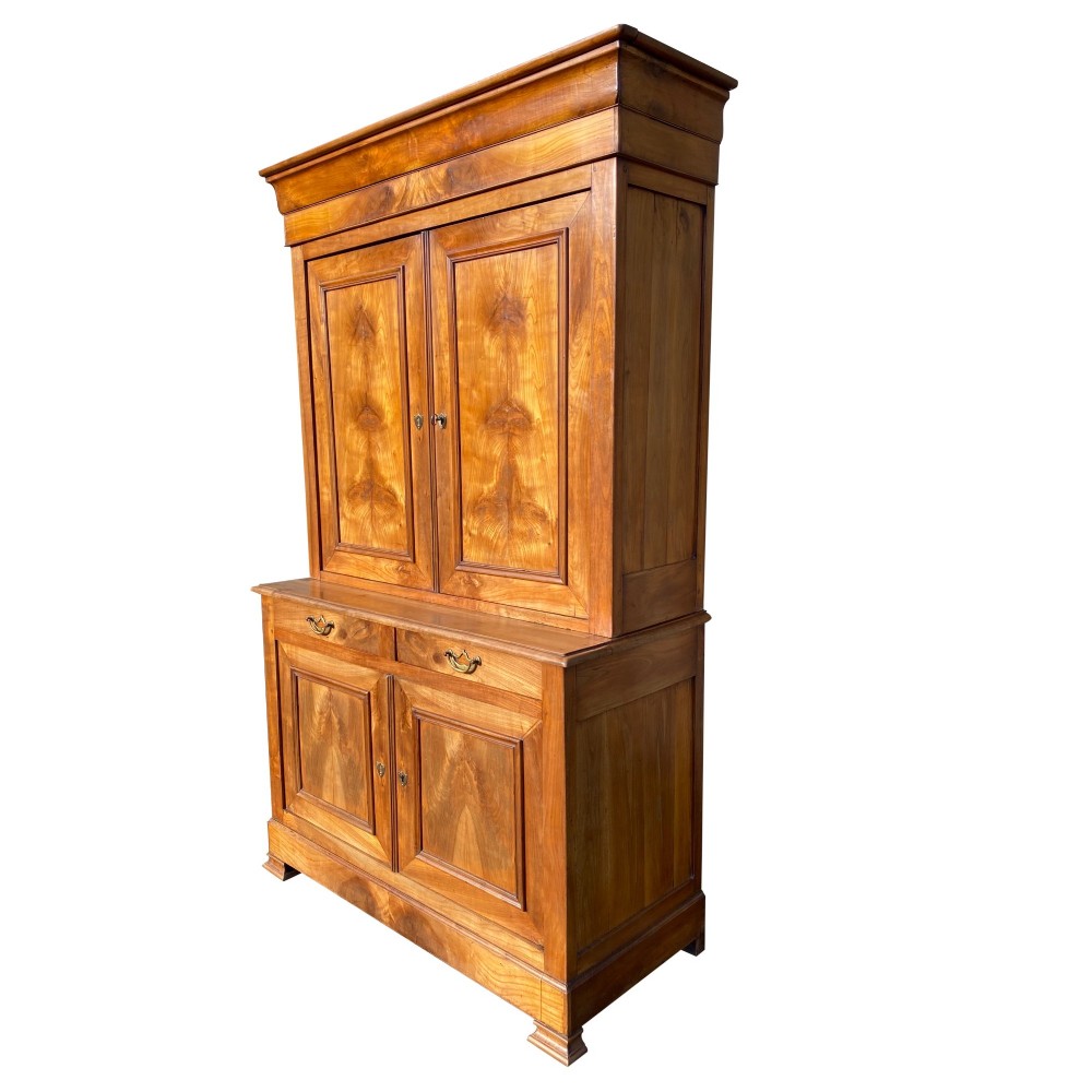 A 19th-century French two-part solid cherry wood housekeeper cupboard with double doors on the upper and lower sections and two central drawers. View IV