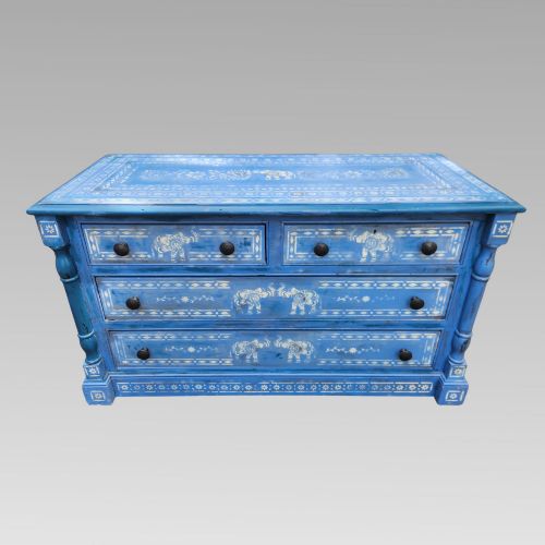 fig 1. A hand-painted blue pine chest of drawers featuring white elephant motifs and dark metal knob handles.