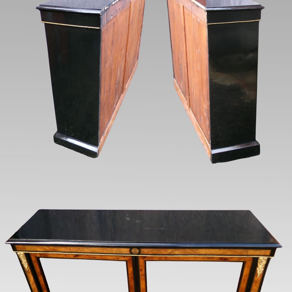A 19th-century Victorian walnut and ebonised display cabinet featuring two glazed doors, gilt metal mounts, and a magenta velvet interior. View III