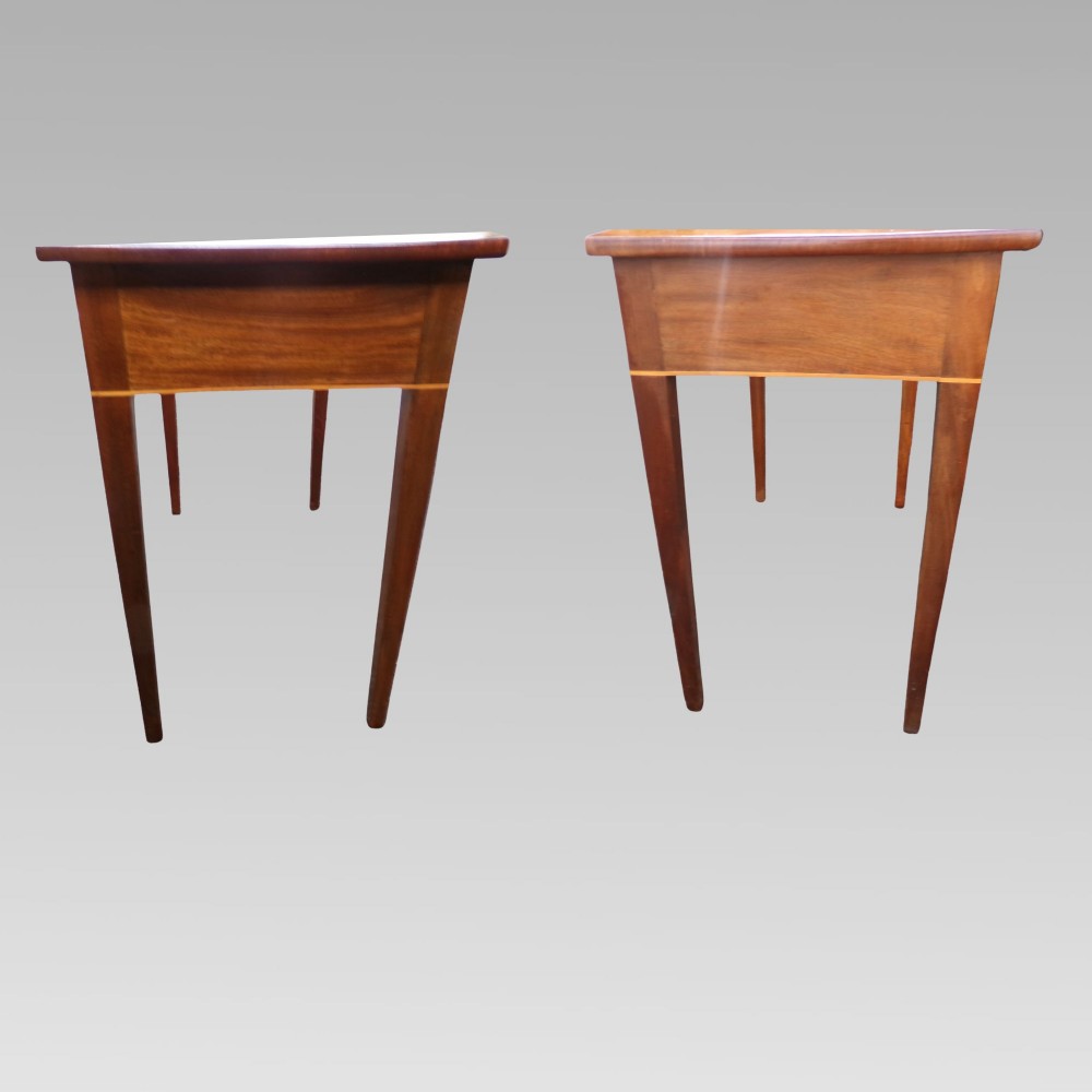 A George III mahogany side table with fine string inlay around the single drawer front and brass ring handles, raised on square tapered legs. View VIII