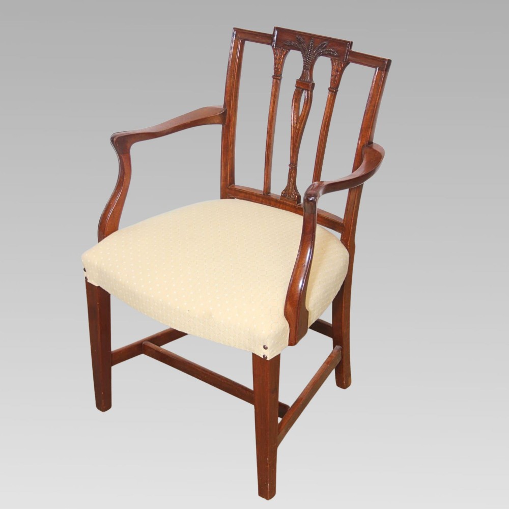 A set of six mahogany Hepplewhite style dining chairs with carved openwork back splats and light cream upholstered seats. View III