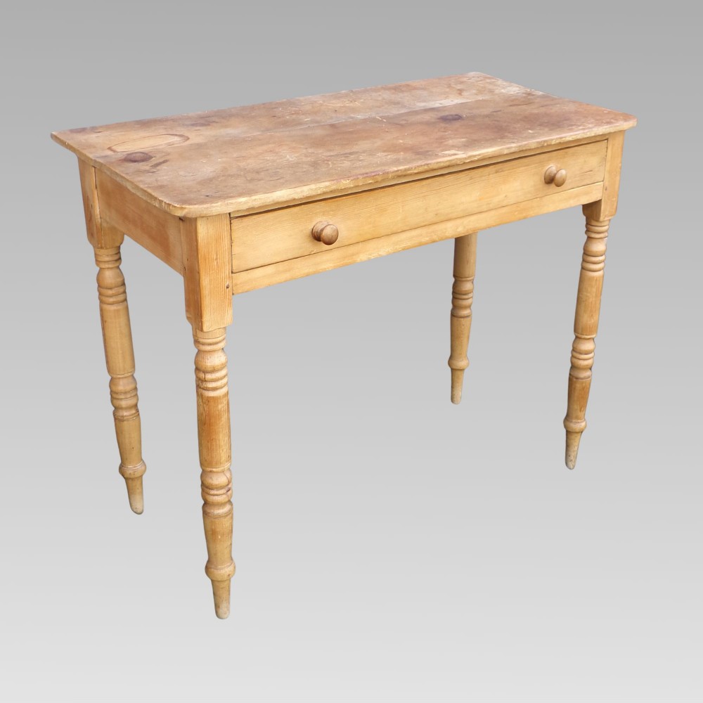A 19th-century Victorian natural pine side table featuring a single wide drawer with wooden knob handles and slender turned legs. View III
