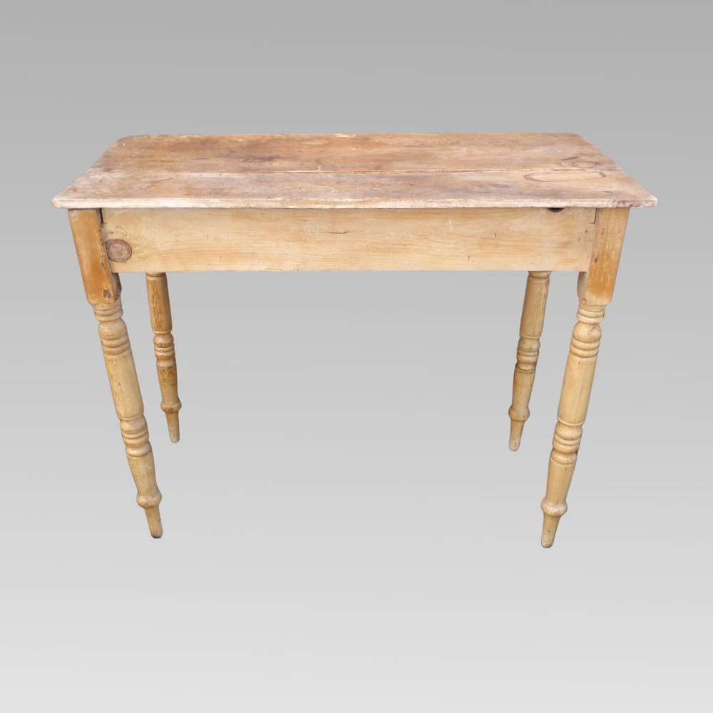 A 19th-century Victorian natural pine side table featuring a single wide drawer with wooden knob handles and slender turned legs. View V
