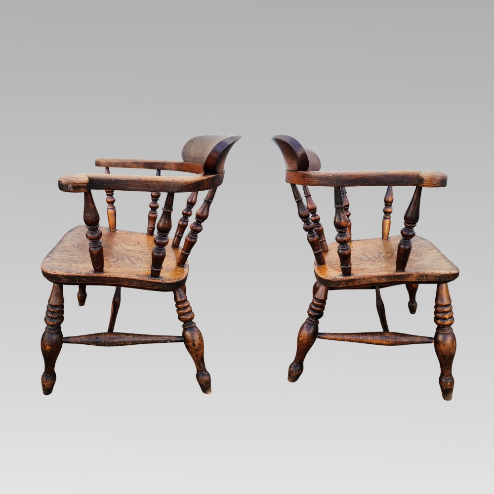 A nineteenth-century turned wood smokers bow armchair featuring a shaped elm seat and turned beech spindles. View III