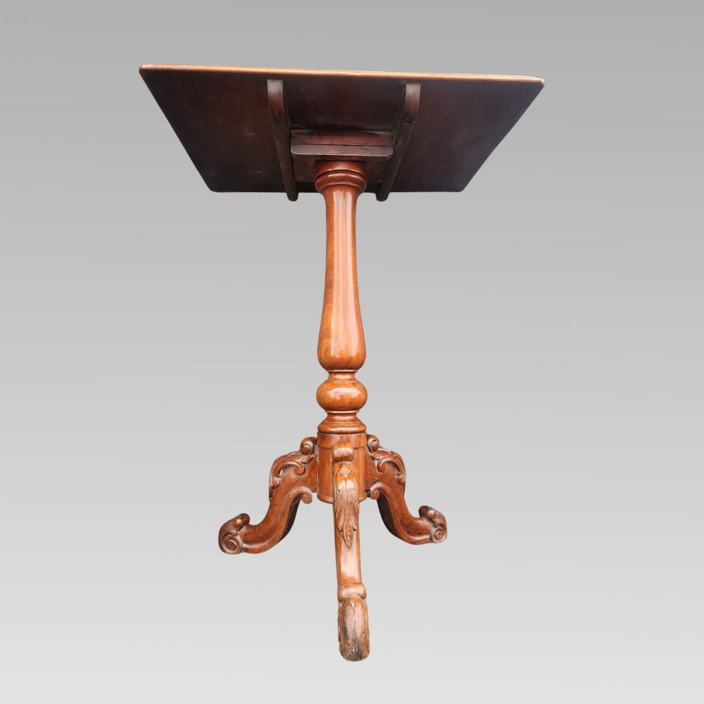 A 19th-century Victorian mahogany side table featuring a rectangular tilt top supported by a turned baluster column and carved tripod legs. View III