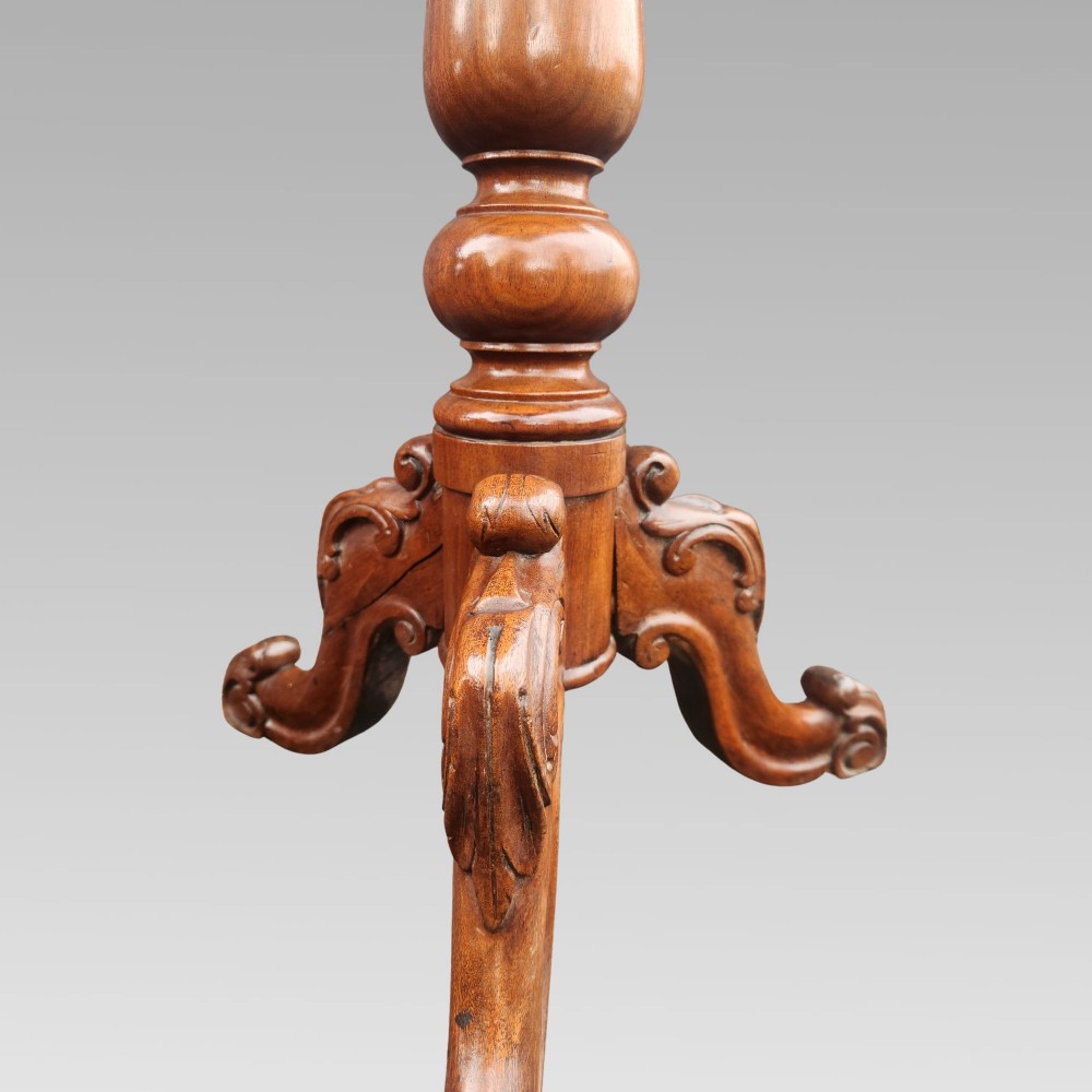 A 19th-century Victorian mahogany side table featuring a rectangular tilt top supported by a turned baluster column and carved tripod legs. View IV