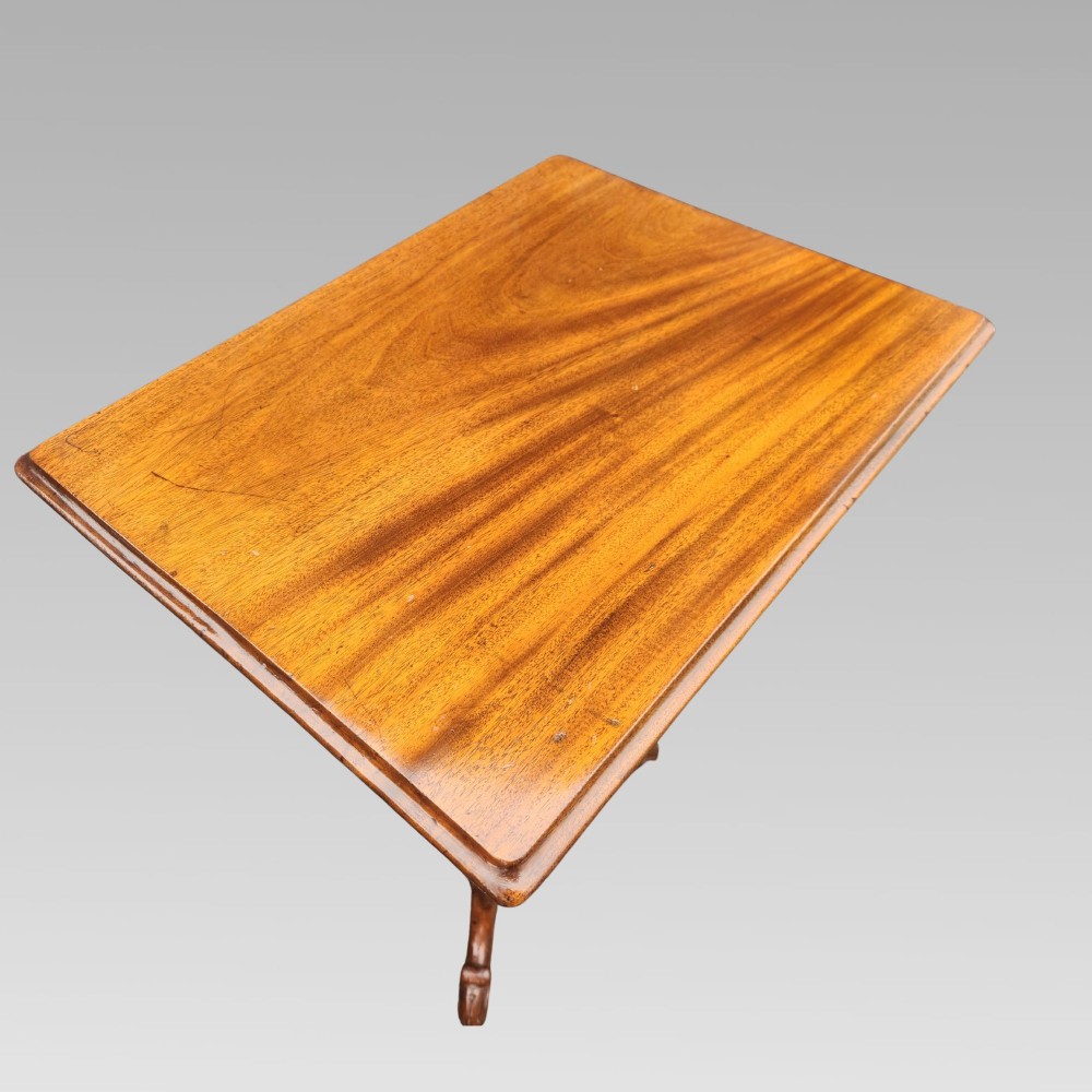 A 19th-century Victorian mahogany side table featuring a rectangular tilt top supported by a turned baluster column and carved tripod legs. View VI