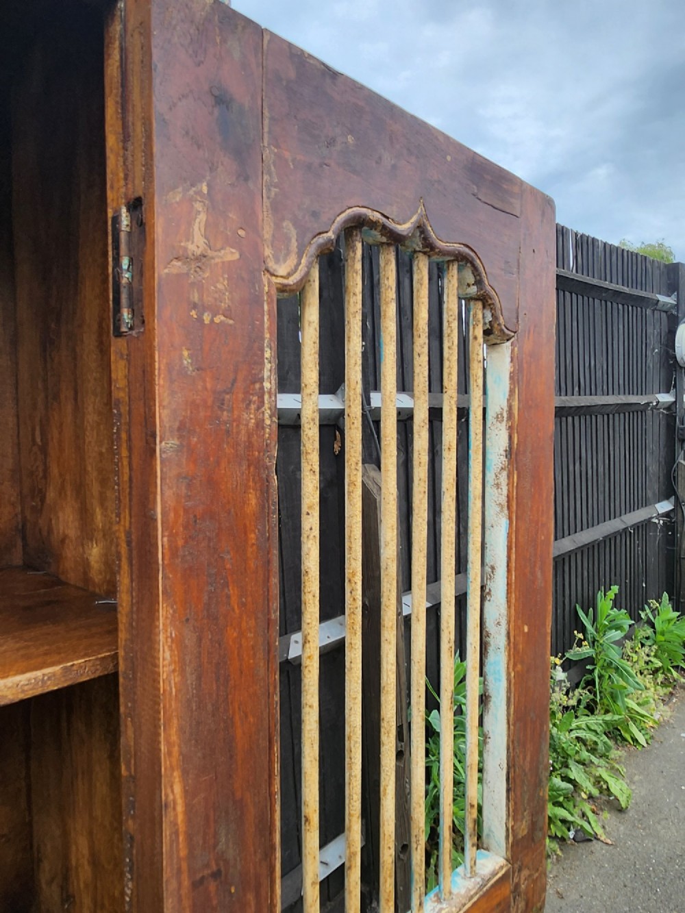 A tall reclaimed teak cupboard featuring two double doors with upper vertical metal slats and a distressed blue and raw timber finish. View IX