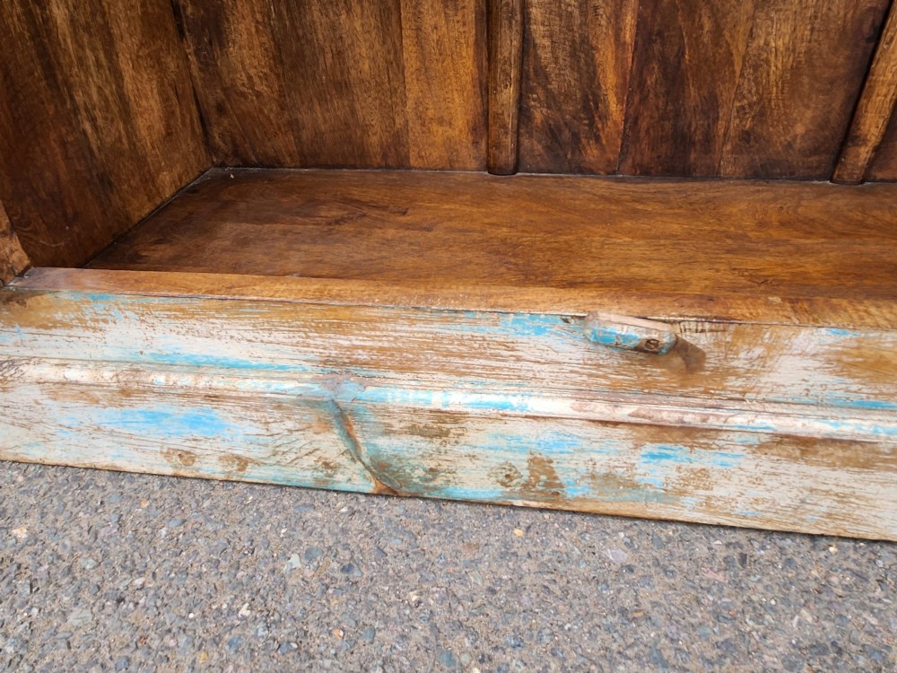 A tall reclaimed teak cupboard featuring two double doors with upper vertical metal slats and a distressed blue and raw timber finish. View X