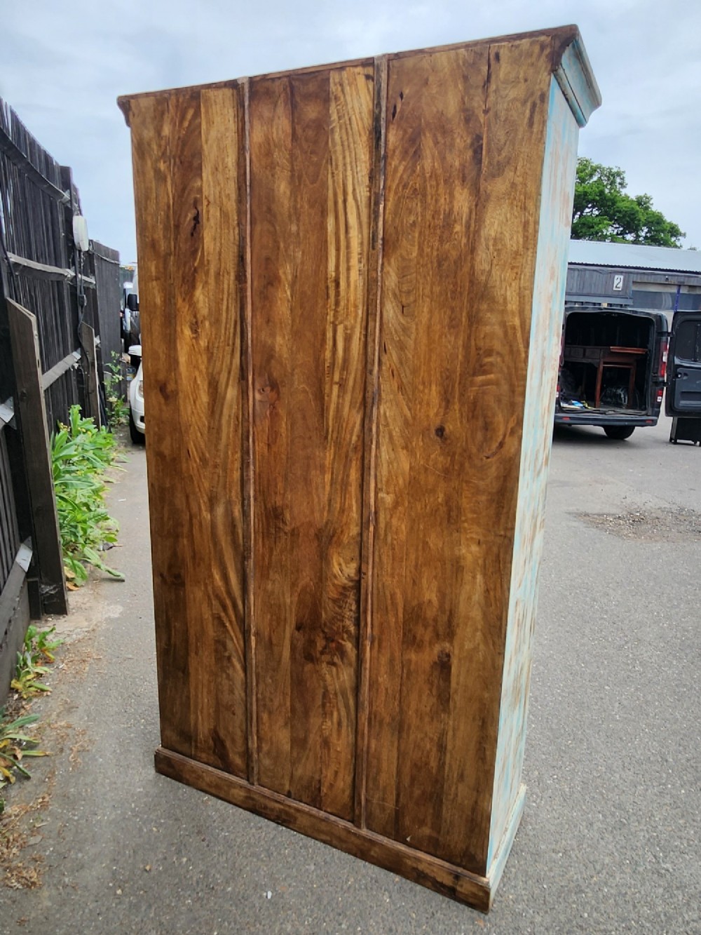 A tall reclaimed teak cupboard featuring two double doors with upper vertical metal slats and a distressed blue and raw timber finish. View XV