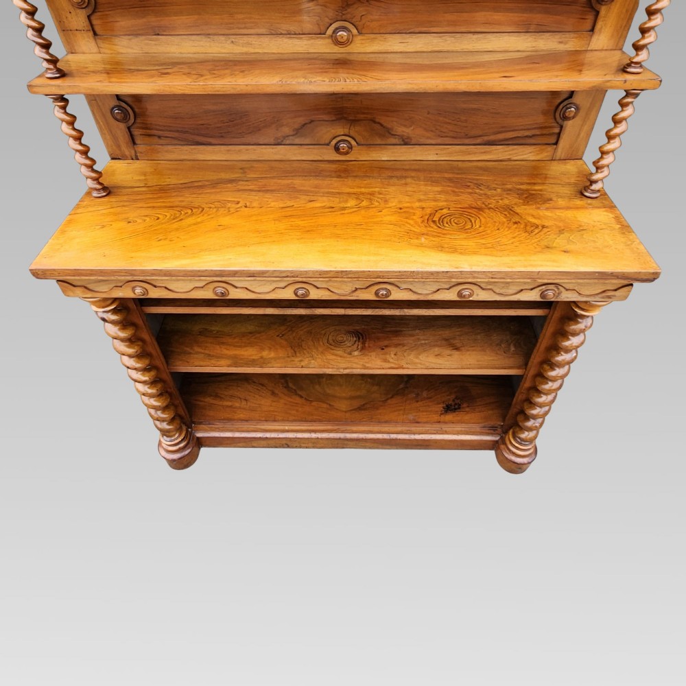 A late Victorian warm brown walnut open buffet sideboard featuring barley twist columns, two upper display shelves, and open base shelving. View III