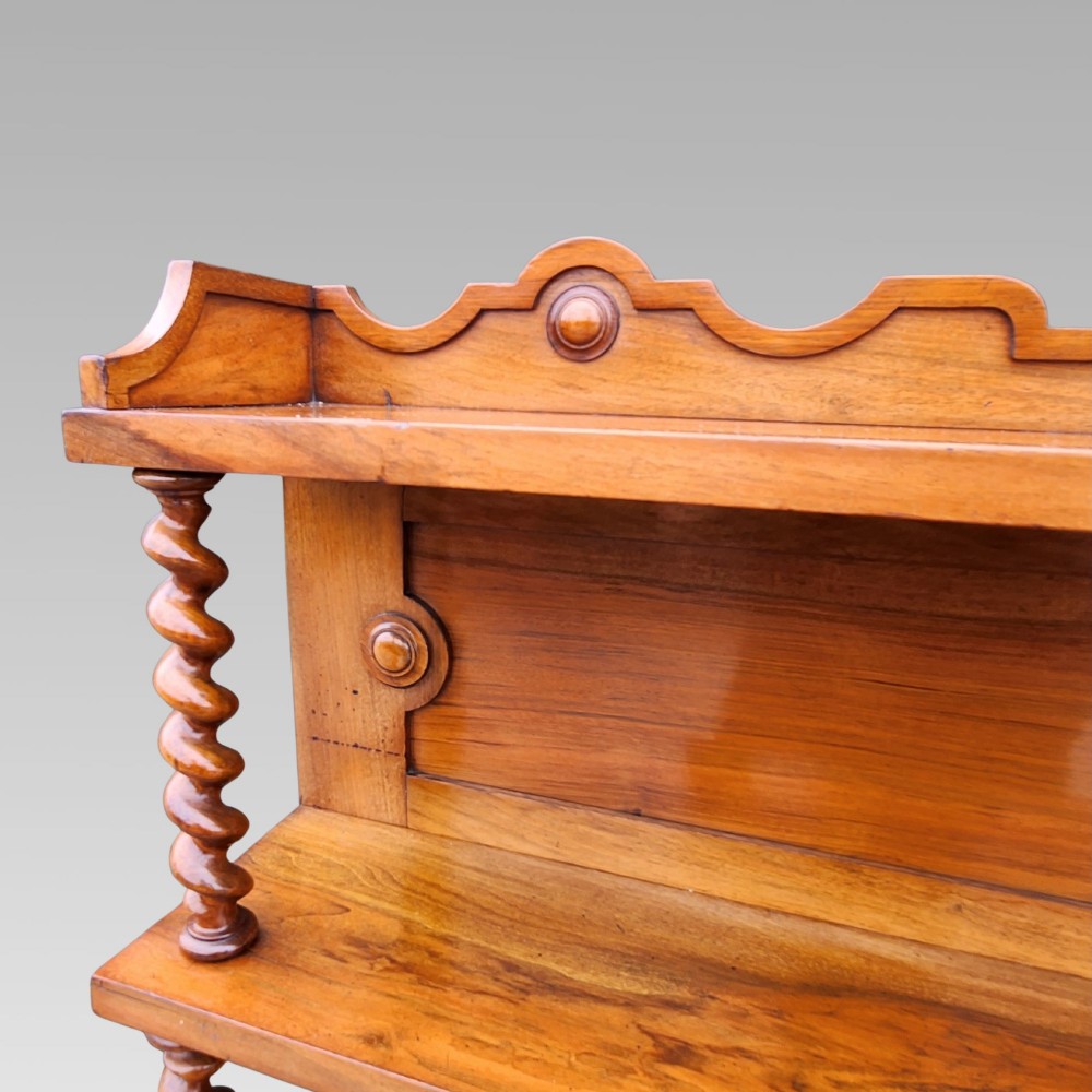 A late Victorian warm brown walnut open buffet sideboard featuring barley twist columns, two upper display shelves, and open base shelving. View VII