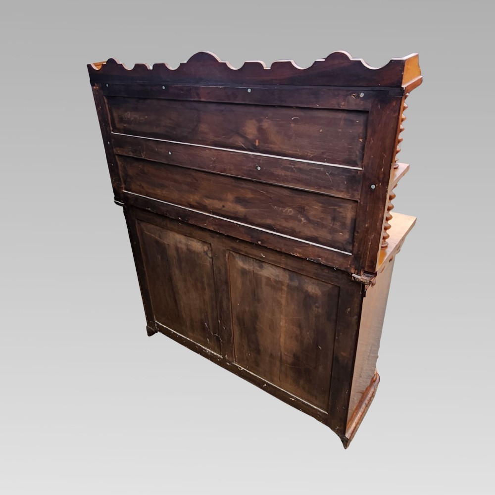 A late Victorian warm brown walnut open buffet sideboard featuring barley twist columns, two upper display shelves, and open base shelving. View IX