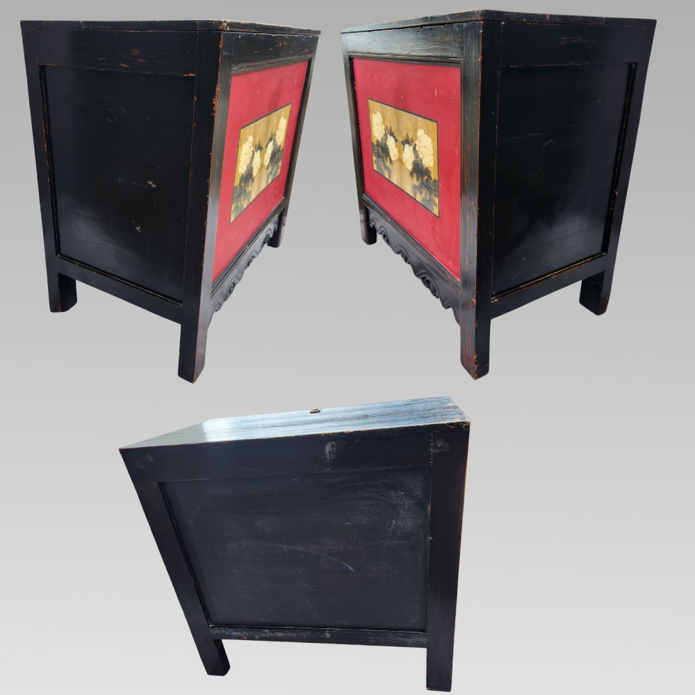 A dark lacquered wooden storage chest featuring a framed red panel with a hand-painted floral image of white peonies on a gold background. View VI