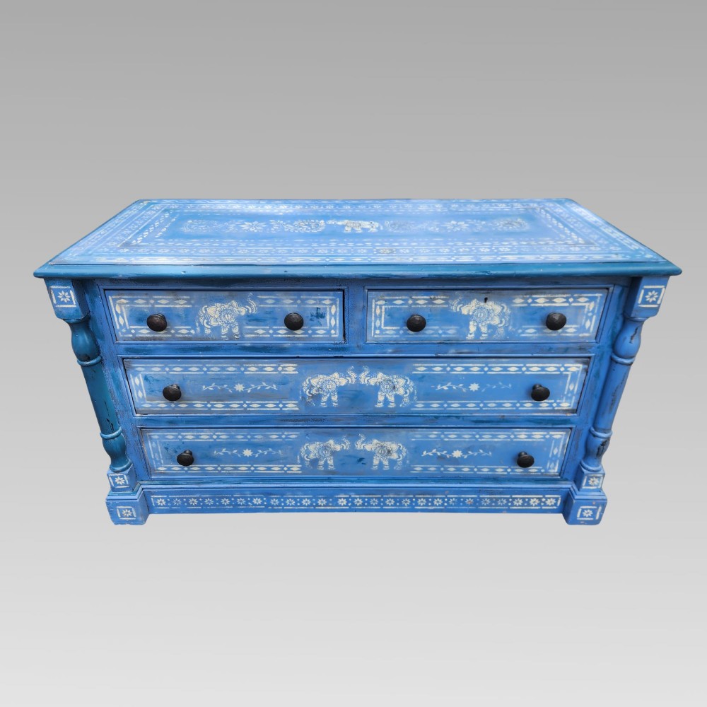 A hand-painted blue pine chest of drawers featuring white elephant motifs and dark metal knob handles. View II
