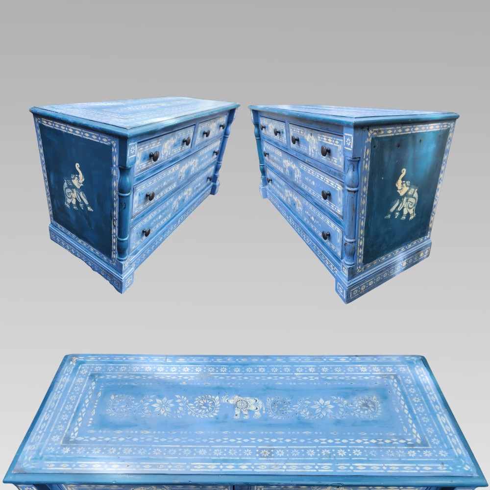 A hand-painted blue pine chest of drawers featuring white elephant motifs and dark metal knob handles. View III