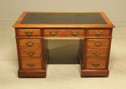 fig 1. An early 20th century mahogany writing desk.