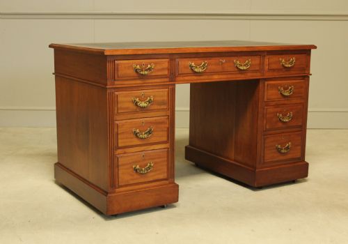 fig 2. An early 20th century mahogany writing desk.