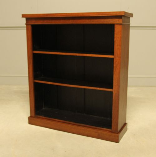 fig 1. A Victorian Walnut open bookcase.