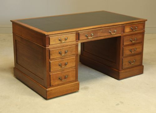 A Large Mahogany Kneehole Writing Desk.