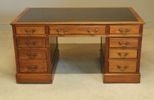 fig 2. A Large mahogany kneehole writing desk.