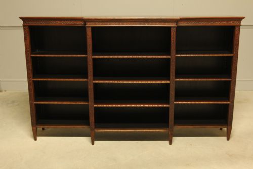 fig 1. A early 20th century mahogany breakfront open bookcase.