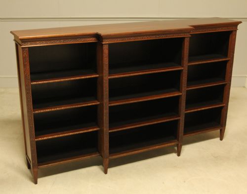 fig 2. A early 20th century mahogany breakfront open bookcase.