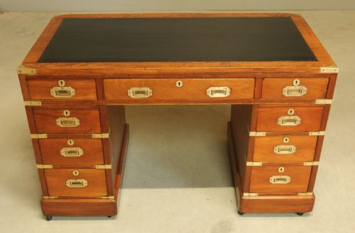 fig 3. A MAHOGANY MILITARY CAMPAIGN DESK
