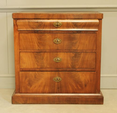 fig 2. A Curl mahogany 19th-century Swedish late Empire chest of drawers.