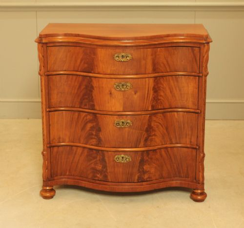 fig 1. A 19th century Swedish serpentine chest of drawers.
