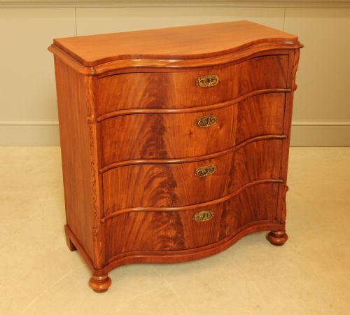 fig 3. A 19th century Swedish serpentine chest of drawers.