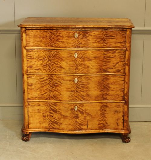 fig 1. A 19th century Swedish serpentine chest of drawers.