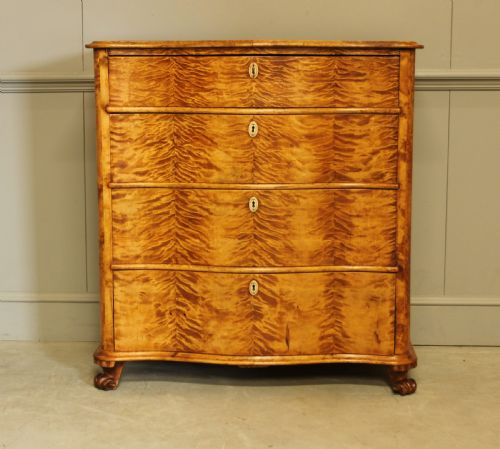 fig 2. A 19th century Swedish serpentine chest of drawers.