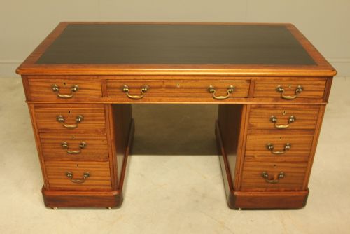 fig 1. An early 20th-century mahogany twin-pedestal writing desk