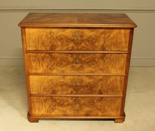 fig 2. A 19th-century Swedish burr walnut secretaire chest of drawers