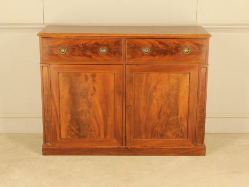 A 1910 Curl‑mahogany Two Door Sideboard