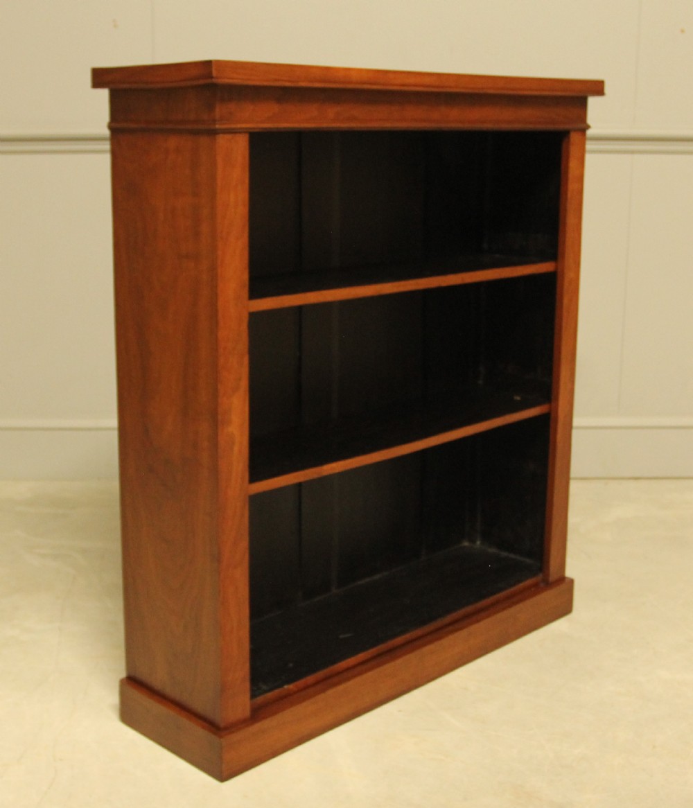 A Victorian Walnut open bookcase. View III