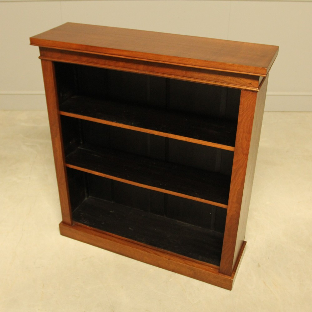 A Victorian Walnut open bookcase. View IV