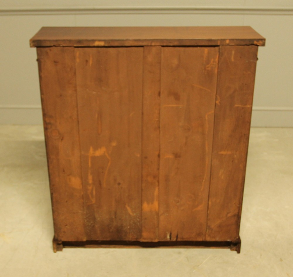 A Victorian Walnut open bookcase. View VII