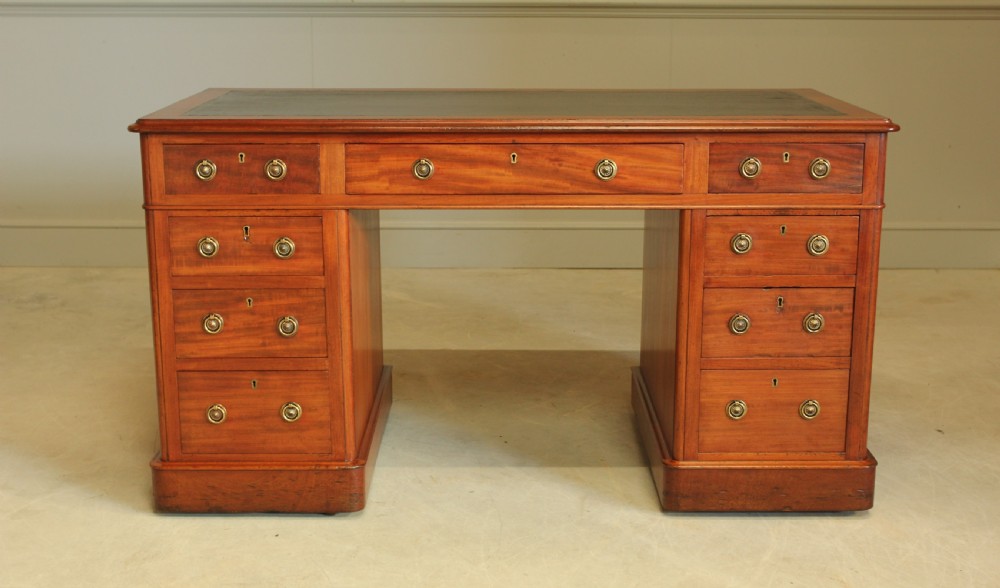 A 19th century Victorian mahogany twin pedestal writing desk