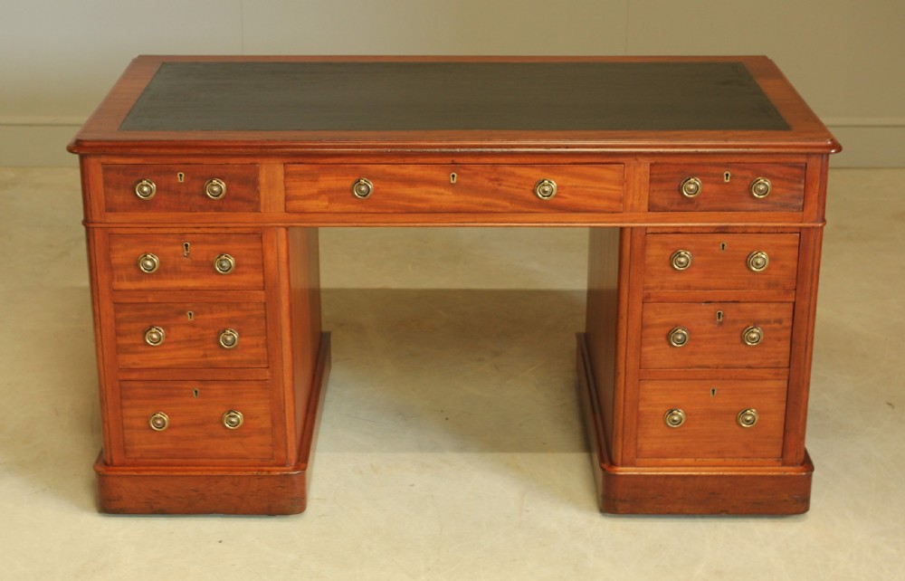 A 19th century Victorian mahogany twin pedestal writing desk View II