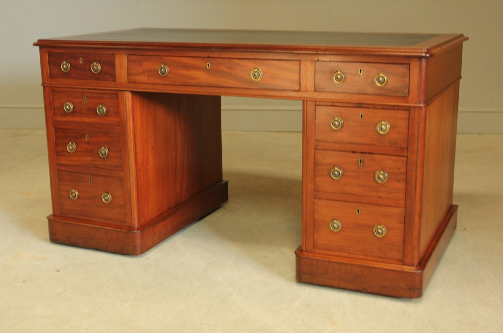 A 19th century Victorian mahogany twin pedestal writing desk View IV
