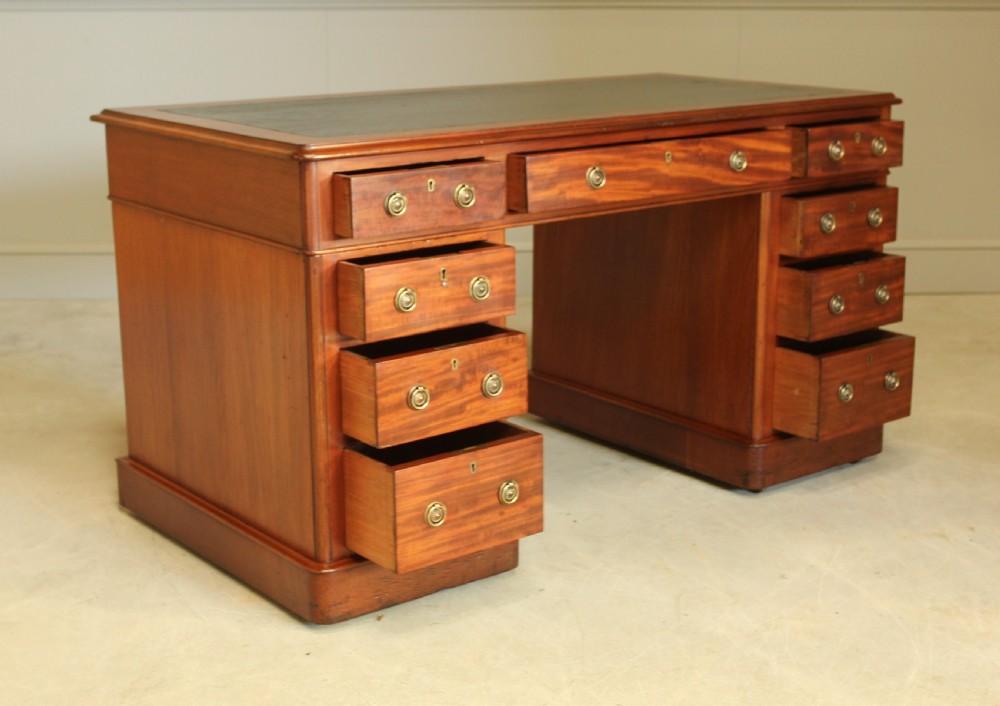 A 19th century Victorian mahogany twin pedestal writing desk View VII