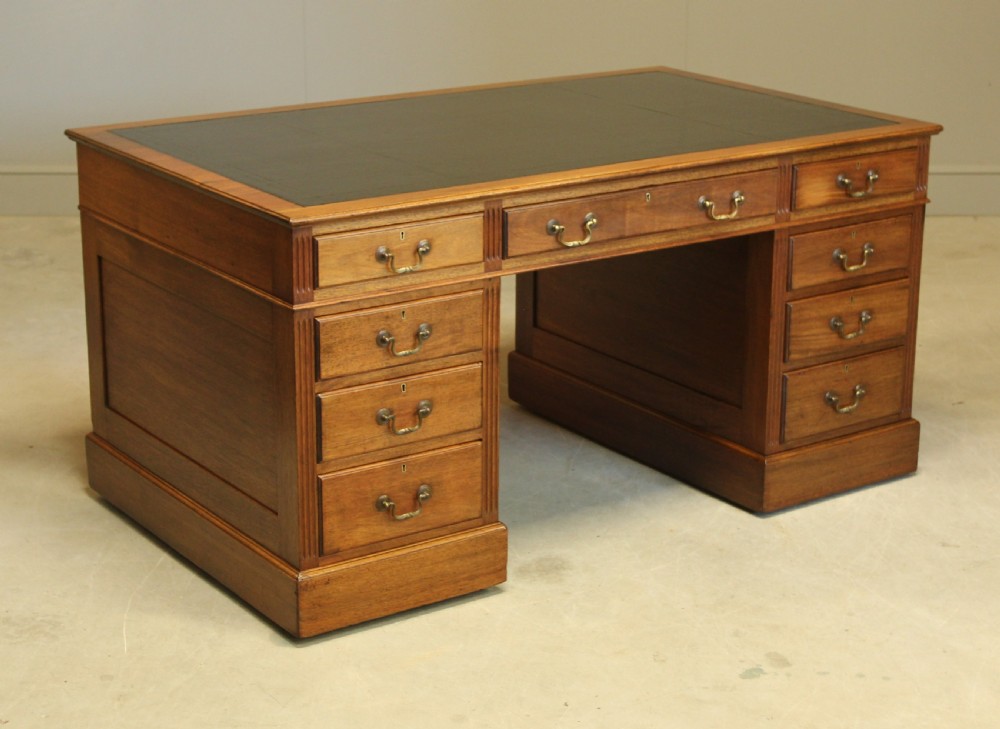 A Large mahogany kneehole writing desk.